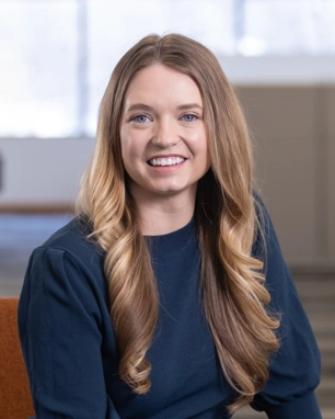 portrait of a smiling person in professional attire